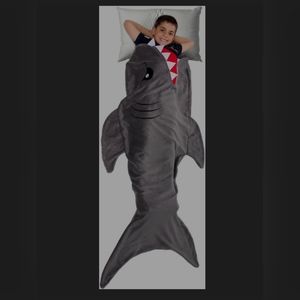 Plush shark tail blanket.Kids fit inside like a sleeping bag (Not an actual slee